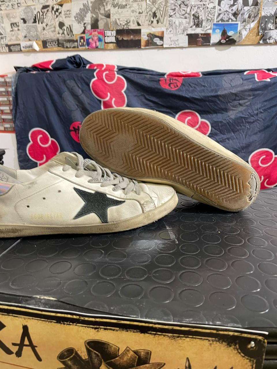 Golden Goose con il fondo consumato e scollato, la diagnosi prima della risuolatura